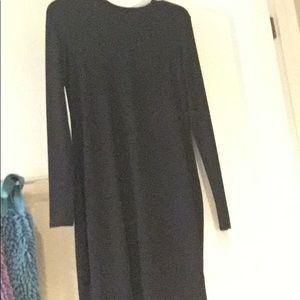 Black long sleeved knee length sweater dress